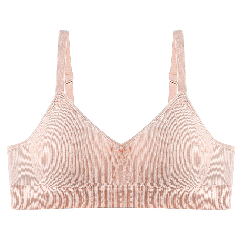 Soft and elastic wireless bra in pink fitting comfortably to skin