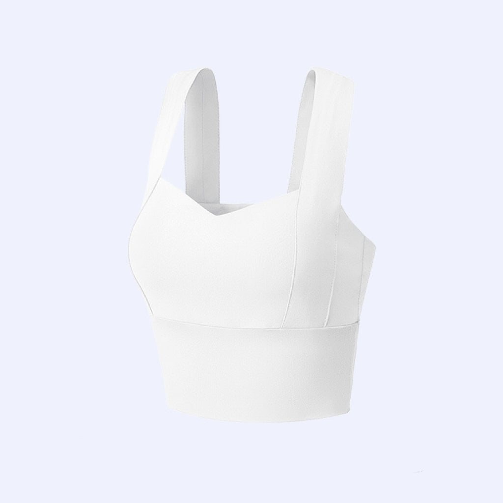"Solid white plus-size sports bra with wide straps for extra support"