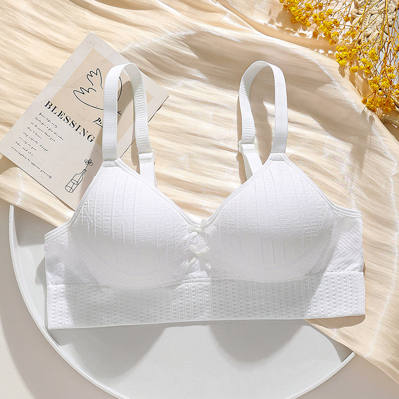 Lightweight and breathable white honeycomb bra, wire-free with lift and side bulge control.