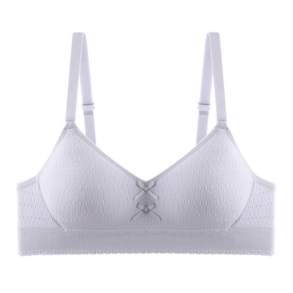 Minimalist white bra with seamless lining and soft fabric designed for comfort and a skin-friendly experience