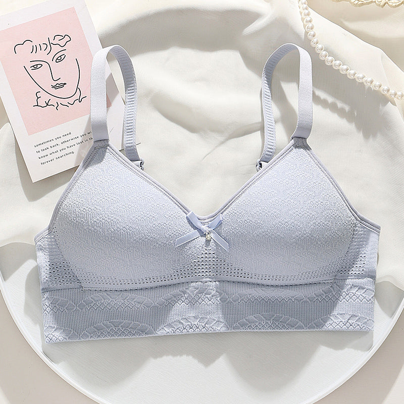 Light blue bra featuring side gathering for extra support and hollow-out breathable cups for comfort