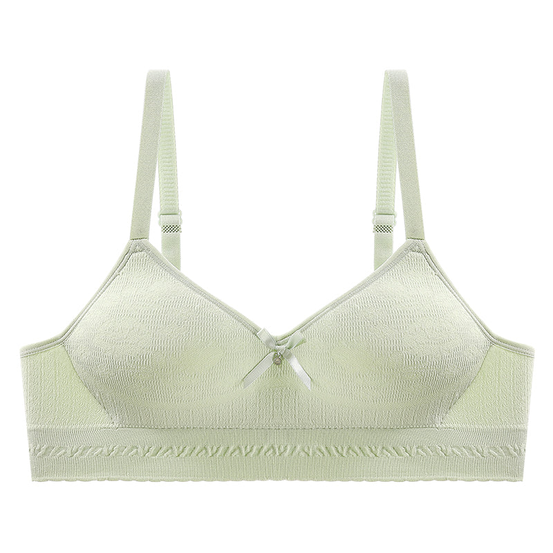 Refreshing light green seamless bra offering a snug fit with breathable, soft fabric