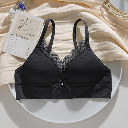 Black seamless knit bra providing youthful elegance, lightweight comfort, and stylish appeal.