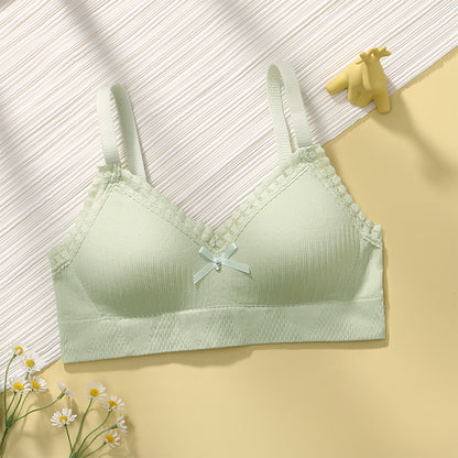 Mint green lightweight and breathable bralette, designed for young girls, with seamless gathering and lace details.