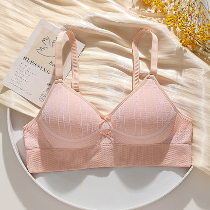 Peach-colored breathable honeycomb bra, wire-free design providing a gentle lift and side bulge control.