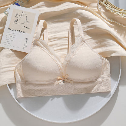 Peach-colored seamless knit bra offering a blend of youthful style and lightweight comfort.