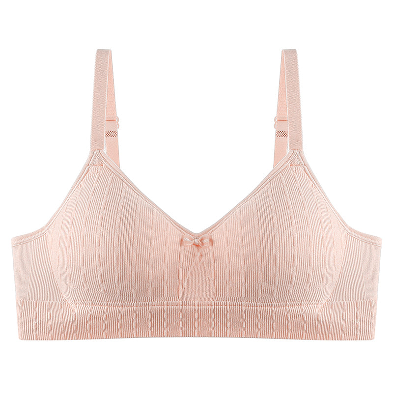 Soft and elastic wireless bra in pink fitting comfortably to skin