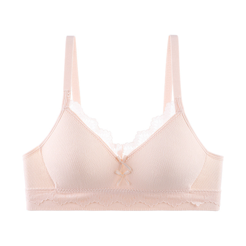 Soft pink bra offering a gentle lift and side bulge reduction for a sleek silhouette.