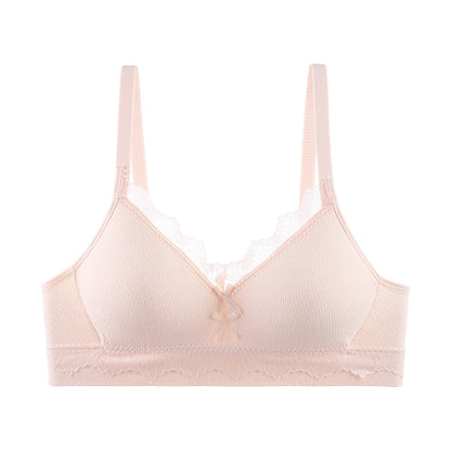 Soft pink bra offering a gentle lift and side bulge reduction for a sleek silhouette.