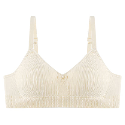 Soft and form-fitting supportive bra in pale yellow.