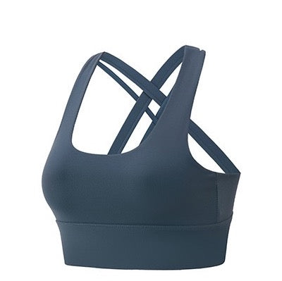 This dark blue women's sports bra top has a cross-over design, u neck, removable padding, and is great for yoga.