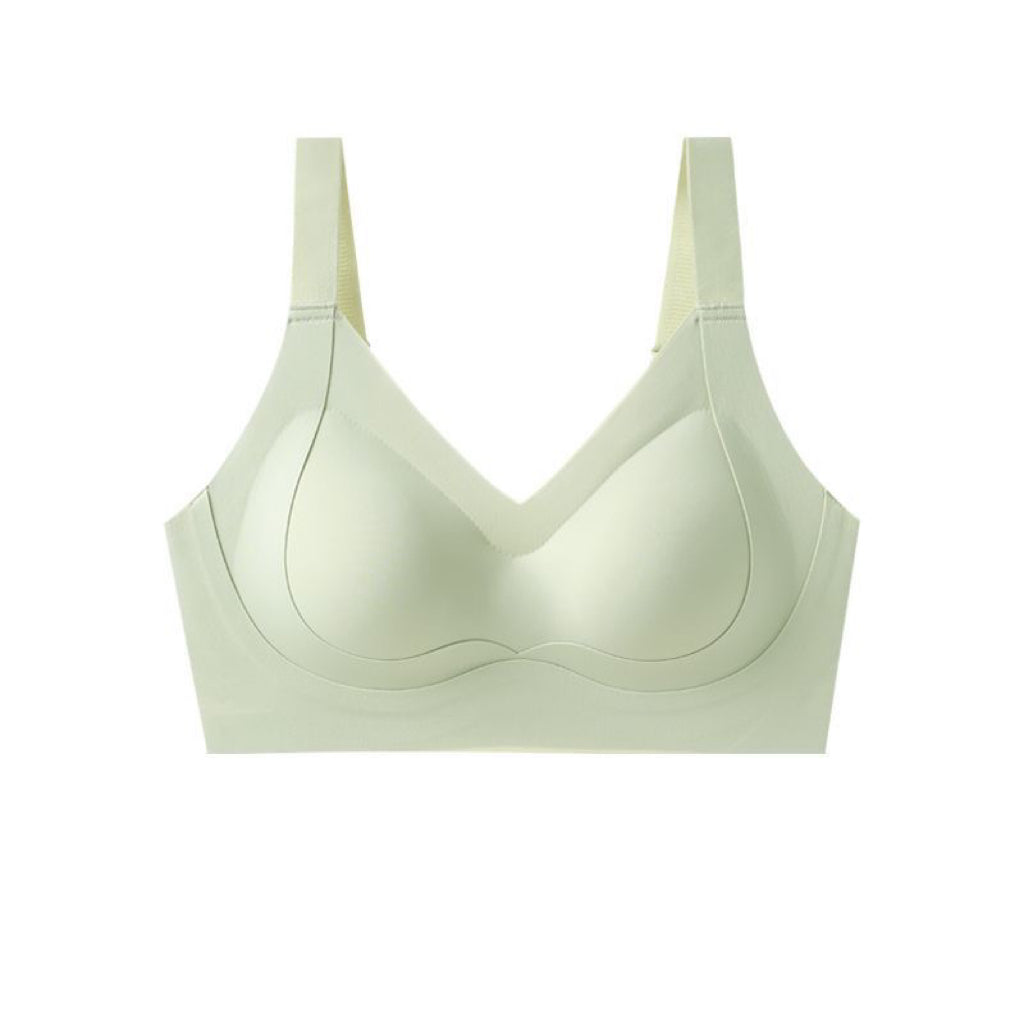 Strong-support, full-coverage sports bra in light green for plus size women, crafted by Ucharm with wide, comfortable straps.