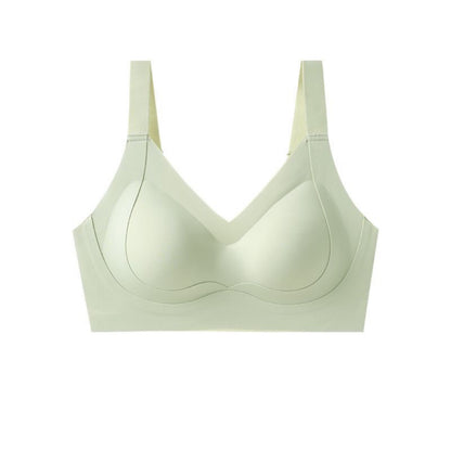 Strong-support, full-coverage sports bra in light green for plus size women, crafted by Ucharm with wide, comfortable straps.