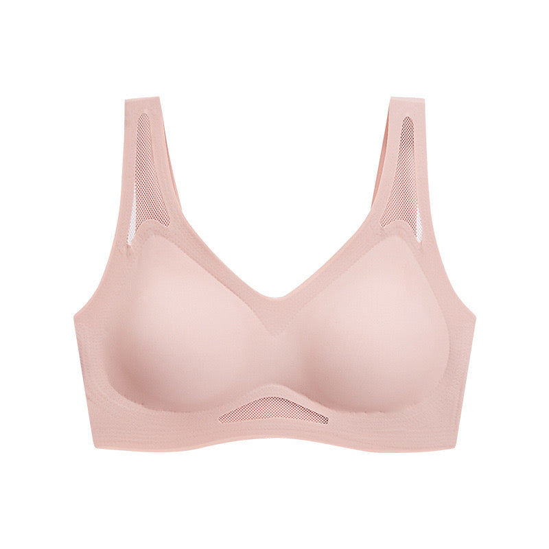 Soft pink seamless sculpting bra with breathable fabric and mesh design made by ucharm bras