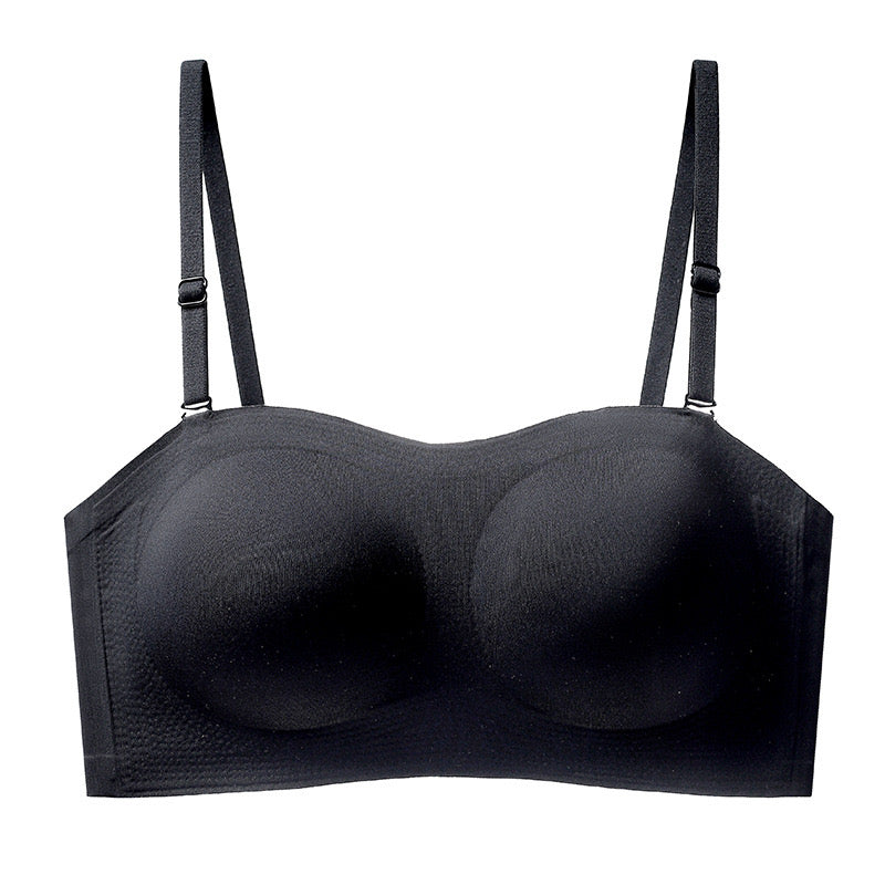 Close-up of a black anti-slip bandeau bra with fine grip detailing and optional straps against a white backdrop