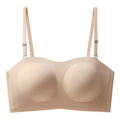 Rear view of a nude anti-slip bandeau bra with adjustable hook closure and clear grip strips