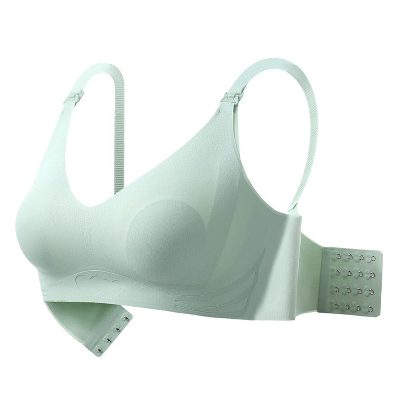 Close-up of mint green fixed cup nursing bra with secure nursing clips