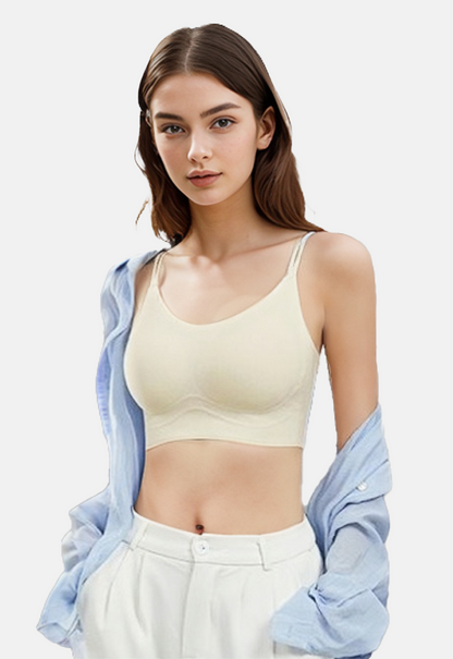 "Model displaying the non-slip feature of an ivory ribbed bralette with stylish back straps"