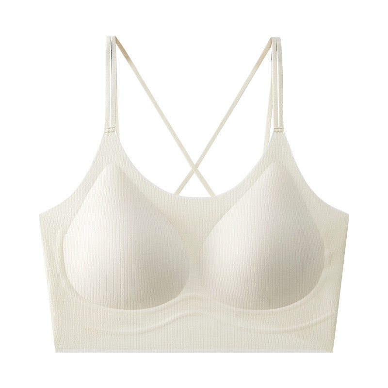 "Ivory ribbed bralette with crisscross straps on a white background"