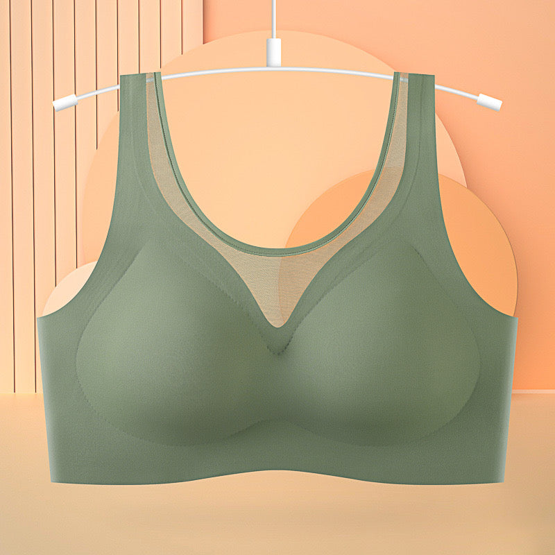 "Sage green seamless back-smoothing bra, ideal for summer wear, on display"