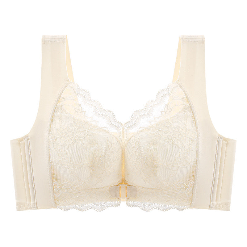 "Ivory lace front-closure bra with anti-sagging design hanging on wall"