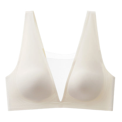 "Front view of a seamless V-mesh design comfort bra in soft beige"