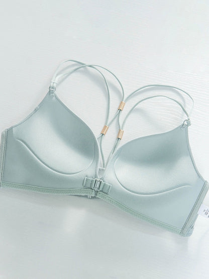 "Sleek light blue smooth bra with a front-open clasp and distinctive multi-strap back design"