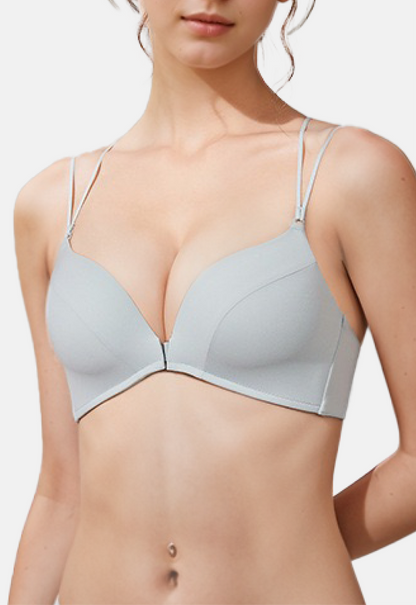 "Light blue seamless bra with a front clasp and multi-strap back design, providing both comfort and style"