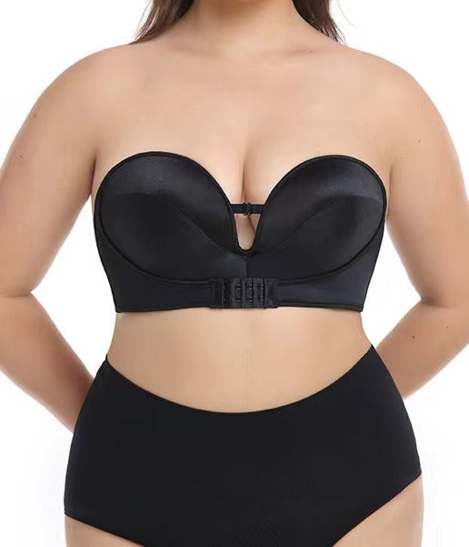 "Plus-size black strapless bra featuring a secure front closure and smooth satin finish"