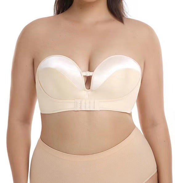 "Front hook closure of a plus-size strapless bra highlighting the easy-to-wear design and satin material"