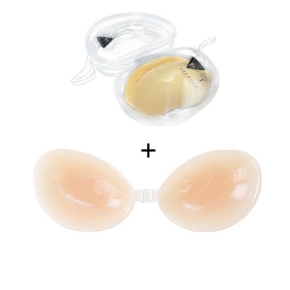 Close-up of a beige Invisible Silicone Adhesive Lift Bra on a transparent holder.