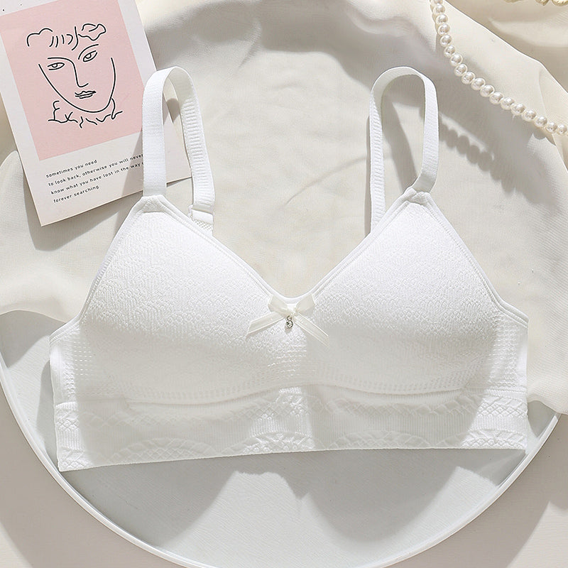 White anti-sagging bra with hollow-out breathable cups and high elasticity for a snug fit