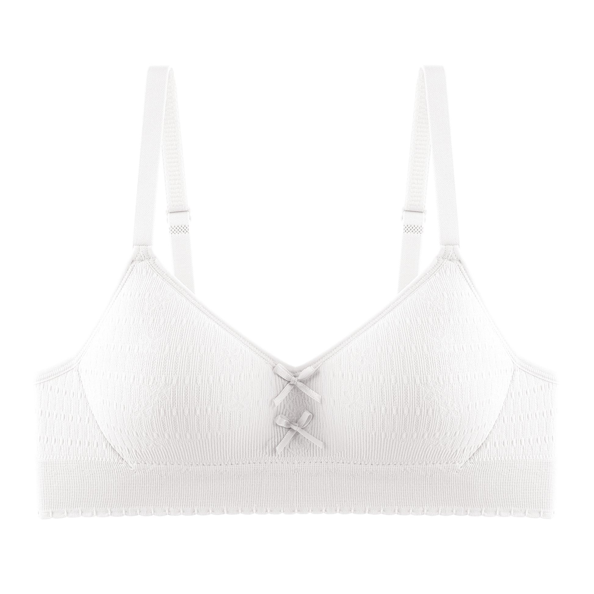 Girl's cream bra with a seamless interior and soft fabric for a comfortable, breathable fit