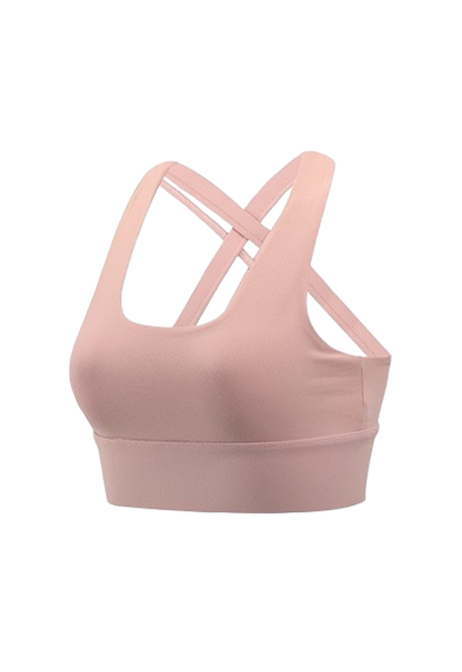 A pink women's sports bra top with a cross-over design, u neck, removable padding, and perfect for yoga.