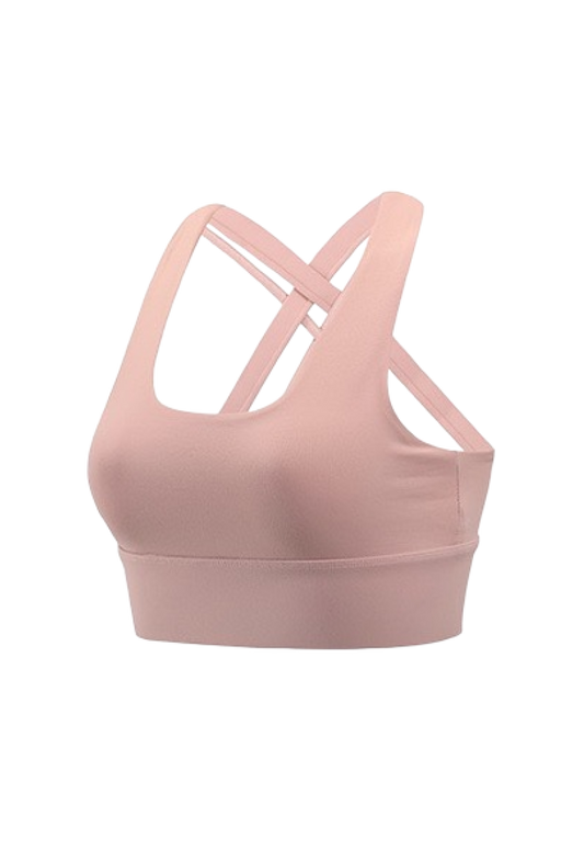 A pink women's sports bra top with a cross-over design, u neck, removable padding, and perfect for yoga.