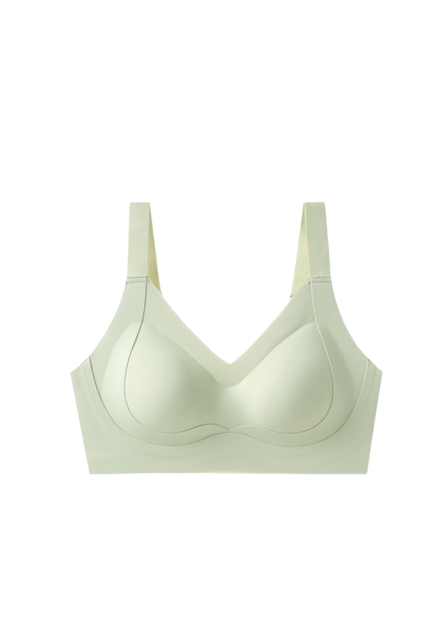 A light green women's sports bra top with strong support, full coverage, broad straps, and designed for plus size women. Made by ucharm bras